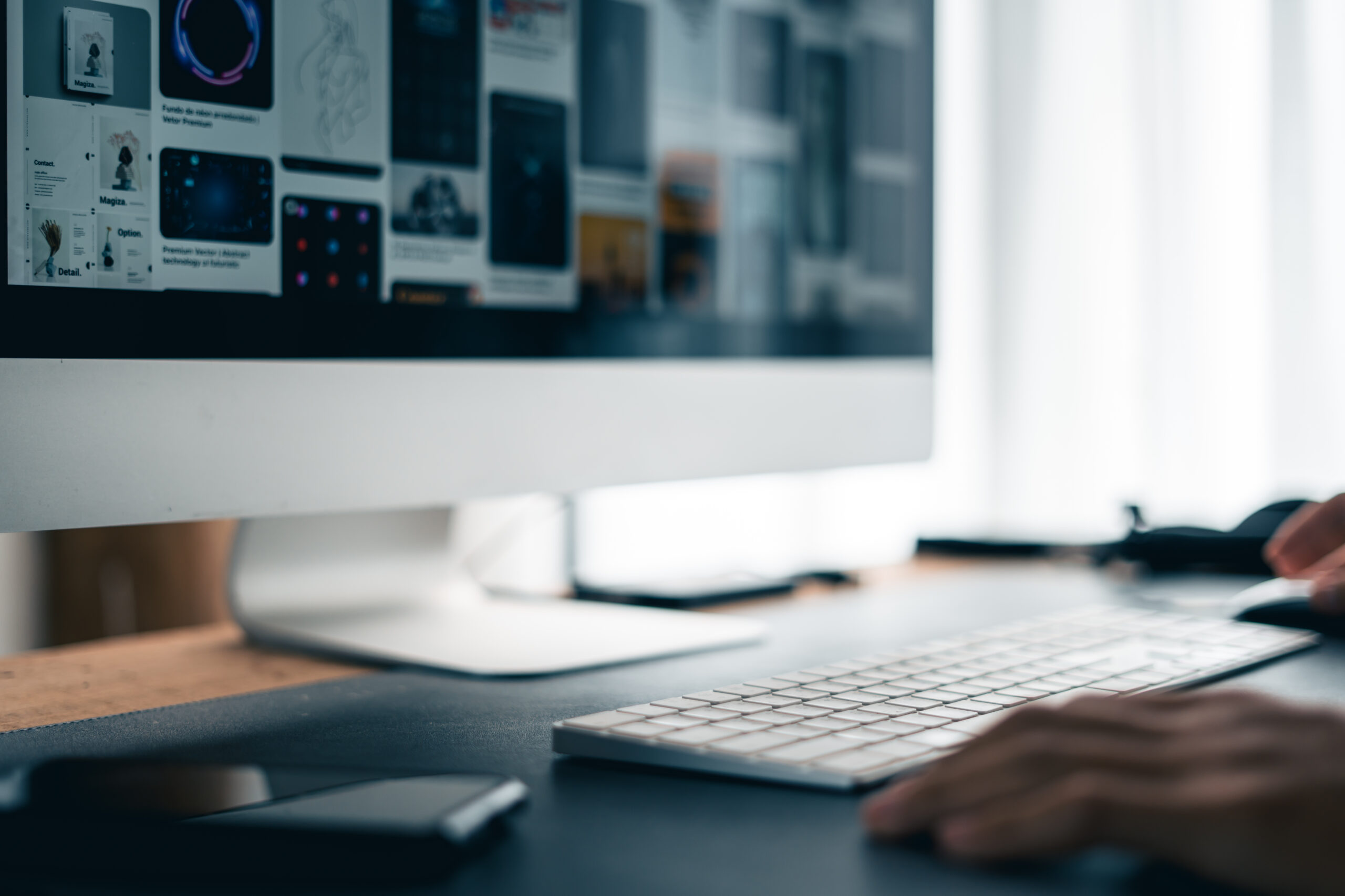 Man working on computer desk at home office